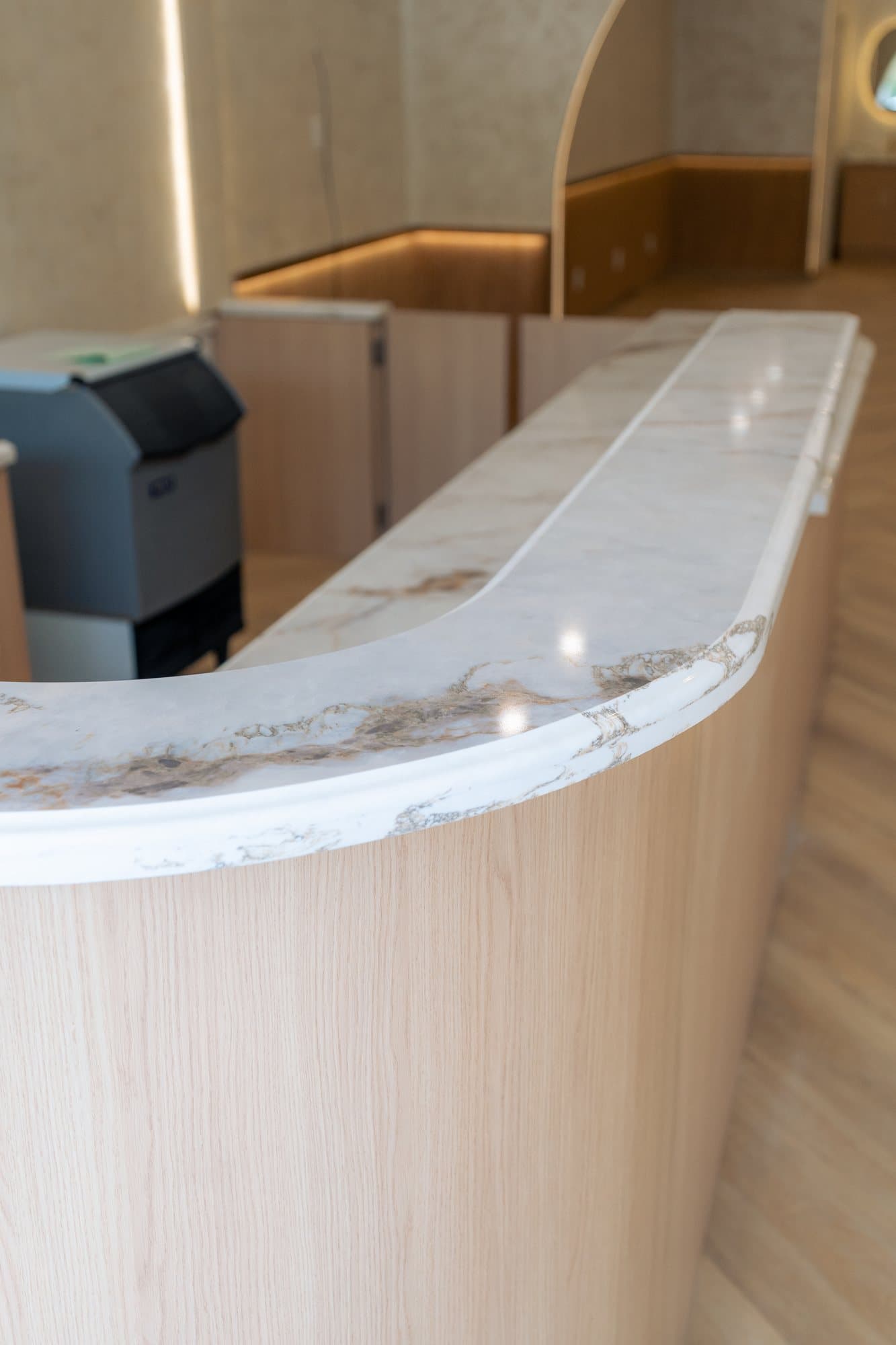 Detail of the marble counter edge as it turns the radius